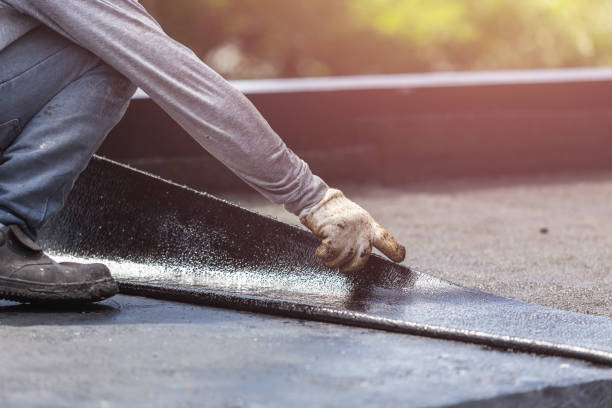 Professional Waterproofing technician working in Winchester, VA